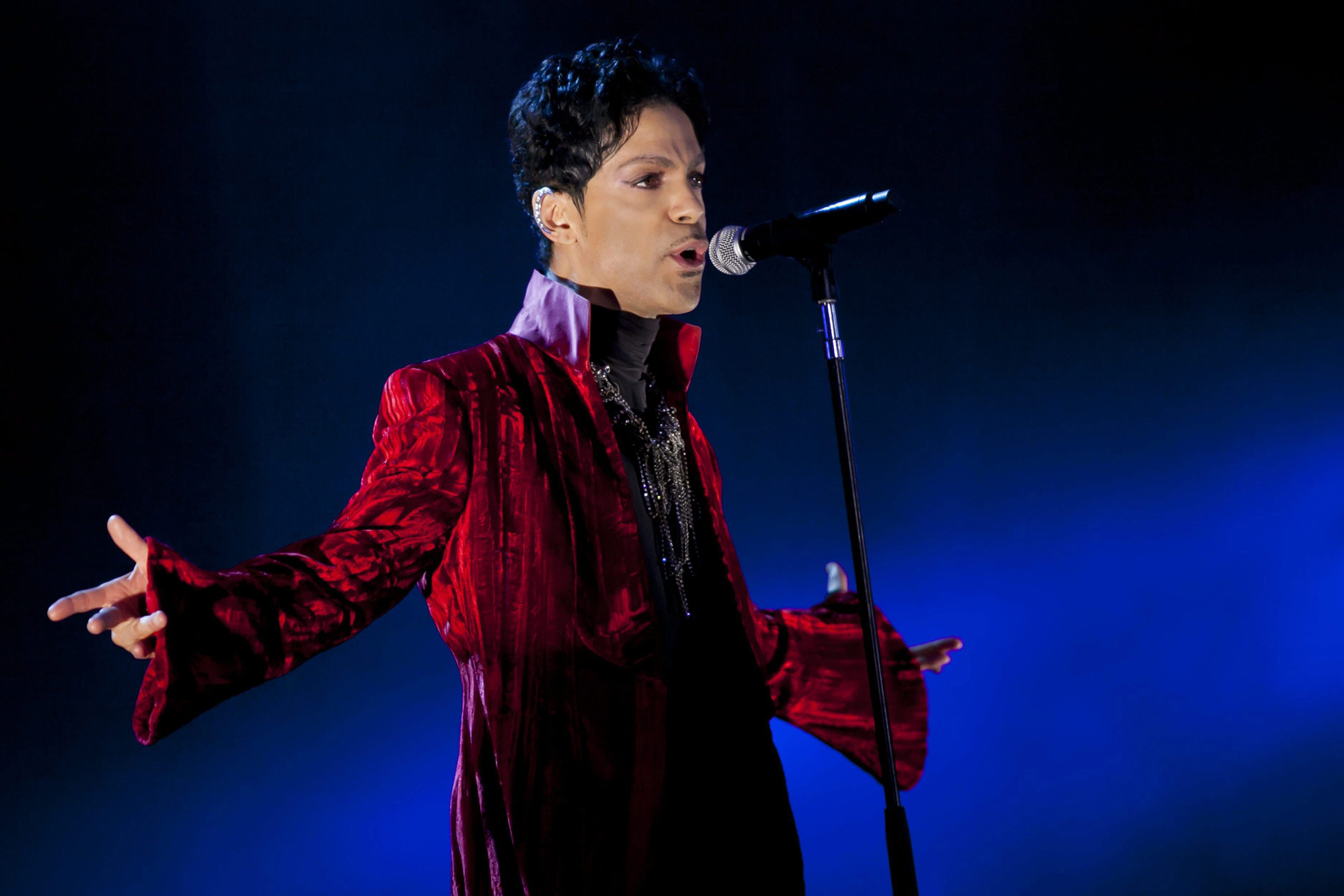 FILE - In this Aug. 9, 2011 file photo, U.S. musician Prince performs during his concert at the Sziget Festival on the Shipyard Island, northern Budapest, Hungary. The enigmatic star flew into London on Tuesday, Feb. 4, 2014, at the start of a still-evolving string of dates in support of forthcoming album "Plectrum Electrum," recorded with all-female trio 3RDEYEGIRL. (AP Photo/MTI, Balazs Mohai, File) HUNGARY OUT
